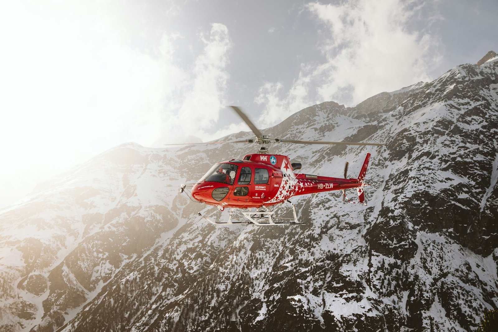 Helicopter operating over mountain terrain